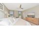 Bright bedroom with king-size bed and built in dresser at 17633 Cantarina Cv, Bradenton, FL 34211
