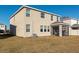 Two-story house with screened patio and backyard at 17633 Cantarina Cv, Bradenton, FL 34211