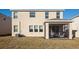 Two-story house with screened patio and backyard at 17633 Cantarina Cv, Bradenton, FL 34211