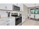 Modern kitchen features stainless steel appliances at 17633 Cantarina Cv, Bradenton, FL 34211