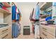 Large walk-in closet with ample shelving and hanging space at 17633 Cantarina Cv, Bradenton, FL 34211