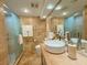 Modern bathroom with updated fixtures and tile at 1906 Gulf N Dr # 106, Bradenton Beach, FL 34217