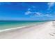 Stunning beach view with white sand and clear water at 1906 Gulf N Dr # 106, Bradenton Beach, FL 34217