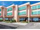 Building exterior showcasing beach access and parking at 1906 Gulf N Dr # 106, Bradenton Beach, FL 34217