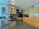 Updated kitchen featuring stainless steel appliances and wood cabinets at 1906 Gulf N Dr # 106, Bradenton Beach, FL 34217