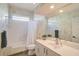 Clean bathroom with a shower/tub combo and updated vanity at 1985 White Feather Ln, Nokomis, FL 34275