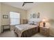 Spacious bedroom with plush bedding and ample closet space at 1985 White Feather Ln, Nokomis, FL 34275