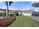 One-story house with a well-maintained lawn and attractive facade at 1985 White Feather Ln, Nokomis, FL 34275