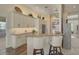 Modern kitchen with granite countertops and updated cabinetry at 1985 White Feather Ln, Nokomis, FL 34275