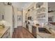 Updated kitchen featuring stainless steel appliances and granite counters at 1985 White Feather Ln, Nokomis, FL 34275