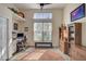 Home office with built-in shelving and window seat at 1985 White Feather Ln, Nokomis, FL 34275