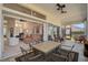 Relaxing screened porch with seating area and view of backyard at 1985 White Feather Ln, Nokomis, FL 34275
