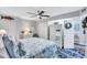 King bedroom suite with coastal decor and ample closet space at 20 Whispering Sands Dr # 306, Sarasota, FL 34242