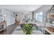 Open concept dining area with ocean views and stylish decor at 20 Whispering Sands Dr # 306, Sarasota, FL 34242