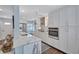 Modern white kitchen with stainless steel appliances at 20 Whispering Sands Dr # 306, Sarasota, FL 34242