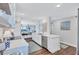 Modern white kitchen with stainless steel appliances at 20 Whispering Sands Dr # 306, Sarasota, FL 34242