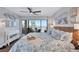 Peaceful main bedroom with ocean view, king bed, and tasteful decor at 20 Whispering Sands Dr # 306, Sarasota, FL 34242