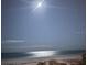 Peaceful night scene on the beach under the moon at 20 Whispering Sands Dr # 306, Sarasota, FL 34242