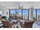 Stunning ocean view from a condo living room, featuring comfortable seating and a relaxing atmosphere at 20 Whispering Sands Dr # 306, Sarasota, FL 34242