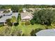Aerial view of a home's backyard and surroundings at 204 Venice Palms Blvd, Venice, FL 34292