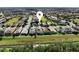 Aerial view showing the house's location in a residential community at 204 Venice Palms Blvd, Venice, FL 34292