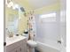 Bathroom with shower/tub combo and nautical theme at 204 Venice Palms Blvd, Venice, FL 34292