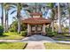 Community information kiosk with Spanish-style architecture at 204 Venice Palms Blvd, Venice, FL 34292