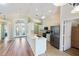 Kitchen features stainless steel appliances and light-colored cabinetry at 204 Venice Palms Blvd, Venice, FL 34292