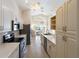 Bright kitchen with stainless steel appliances and ample counter space at 204 Venice Palms Blvd, Venice, FL 34292