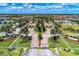 Aerial view of Gran Paradiso community, showcasing its grand entrance and expansive landscape at 20710 Saluti Pl, Venice, FL 34293