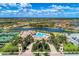 Resort-style community with pool, tennis courts, and clubhouse at 20710 Saluti Pl, Venice, FL 34293