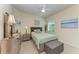 Bedroom with a full-size bed and decorative accents at 20710 Saluti Pl, Venice, FL 34293