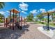playground with play structures and shaded seating at 20710 Saluti Pl, Venice, FL 34293