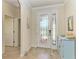 Elegant entryway with tile floors and decorative accents at 20710 Saluti Pl, Venice, FL 34293