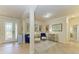 Bright and airy entryway with tile flooring and seating area at 20710 Saluti Pl, Venice, FL 34293