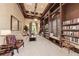 Community library with comfortable seating and plenty of books at 20710 Saluti Pl, Venice, FL 34293