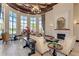 Spacious lobby with comfortable seating areas and a fireplace at 20710 Saluti Pl, Venice, FL 34293