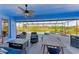 Spacious screened-in patio with pool, spa, and lake view at 20710 Saluti Pl, Venice, FL 34293