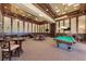 Relaxing recreation room with pool table and card tables at 20710 Saluti Pl, Venice, FL 34293