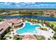 Large freeform pool with plenty of lounge space at 20710 Saluti Pl, Venice, FL 34293