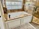 Elegant bathroom with free-standing soaking tub and custom cabinetry at 2704 Barret Ave, Plant City, FL 33566
