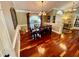 Bright dining room with hardwood floors and a rustic wooden table at 2704 Barret Ave, Plant City, FL 33566