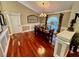 Formal dining room featuring hardwood floors and an elegant chandelier at 2704 Barret Ave, Plant City, FL 33566