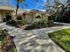 Brick house with a walkway and lush landscaping at 2704 Barret Ave, Plant City, FL 33566