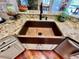 Copper farmhouse sink with granite countertop at 2704 Barret Ave, Plant City, FL 33566