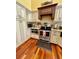 Spacious kitchen with granite countertops, stainless steel appliances, and hardwood floors at 2704 Barret Ave, Plant City, FL 33566