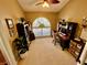 Home office with built-in shelving, a desk, and a large window at 2704 Barret Ave, Plant City, FL 33566