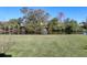 Grass lawn and pond view from the backyard at 2824 47Th E St, Palmetto, FL 34221