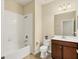 Clean bathroom with a shower/tub combo, toilet and vanity at 2824 47Th E St, Palmetto, FL 34221