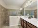 Bathroom with double vanity and walk-in shower at 2824 47Th E St, Palmetto, FL 34221